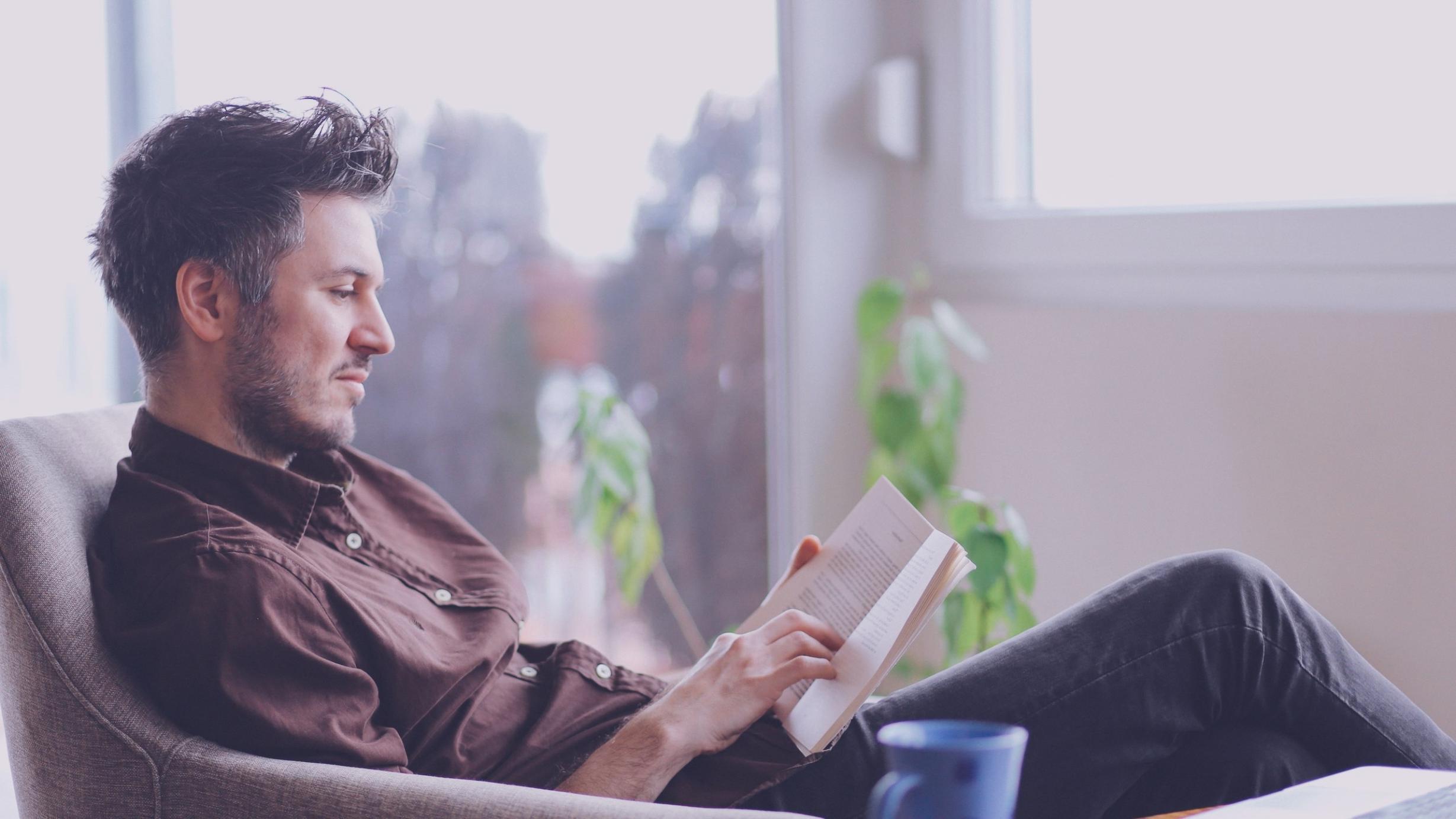 Poetry writing workspace with notebook and creative materials