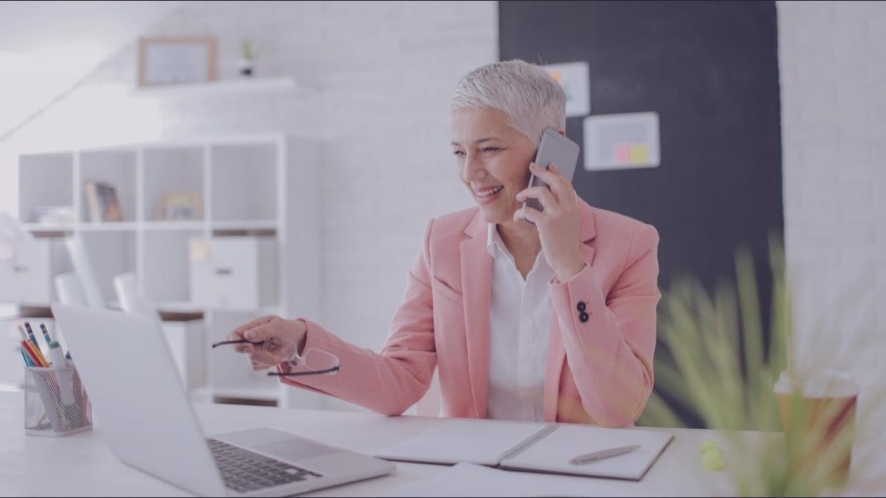 Poetry writing workspace with notebook and pen